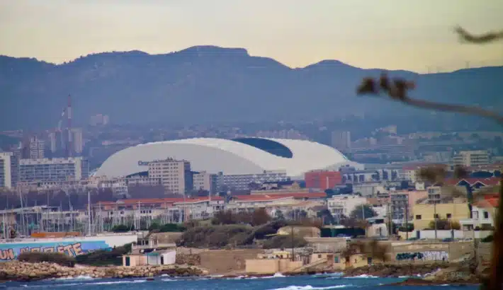 The Orange Vélodrome stadium in Marseille below the hills